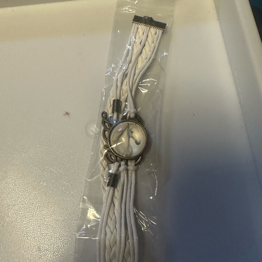 White Braided Watch with White‎ Horse